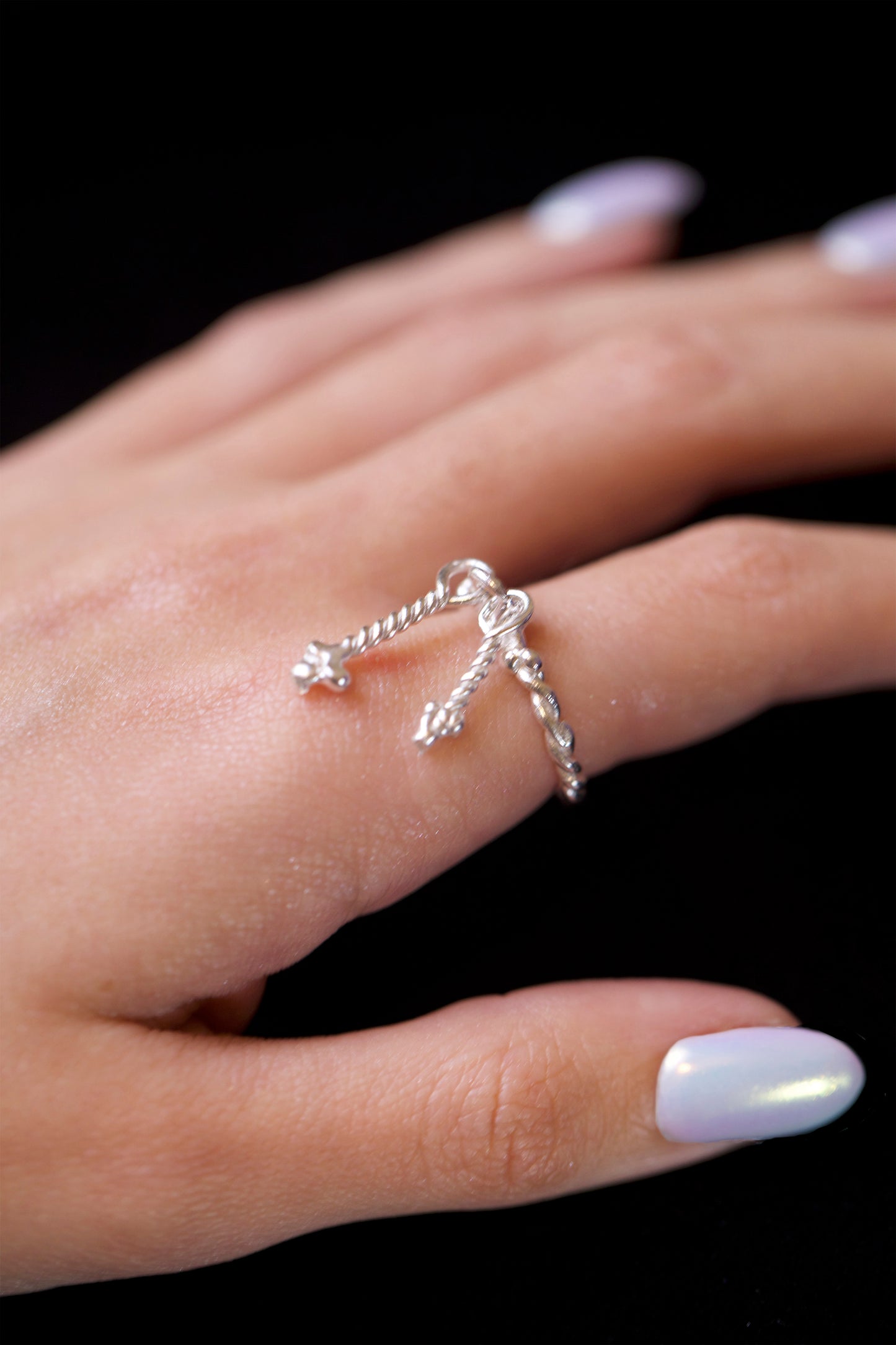 Detail of Twisted Fates Ring. This statement ring is handcraft by an artist in Brooklyn making it a high quality and one-of-a-kind gift.