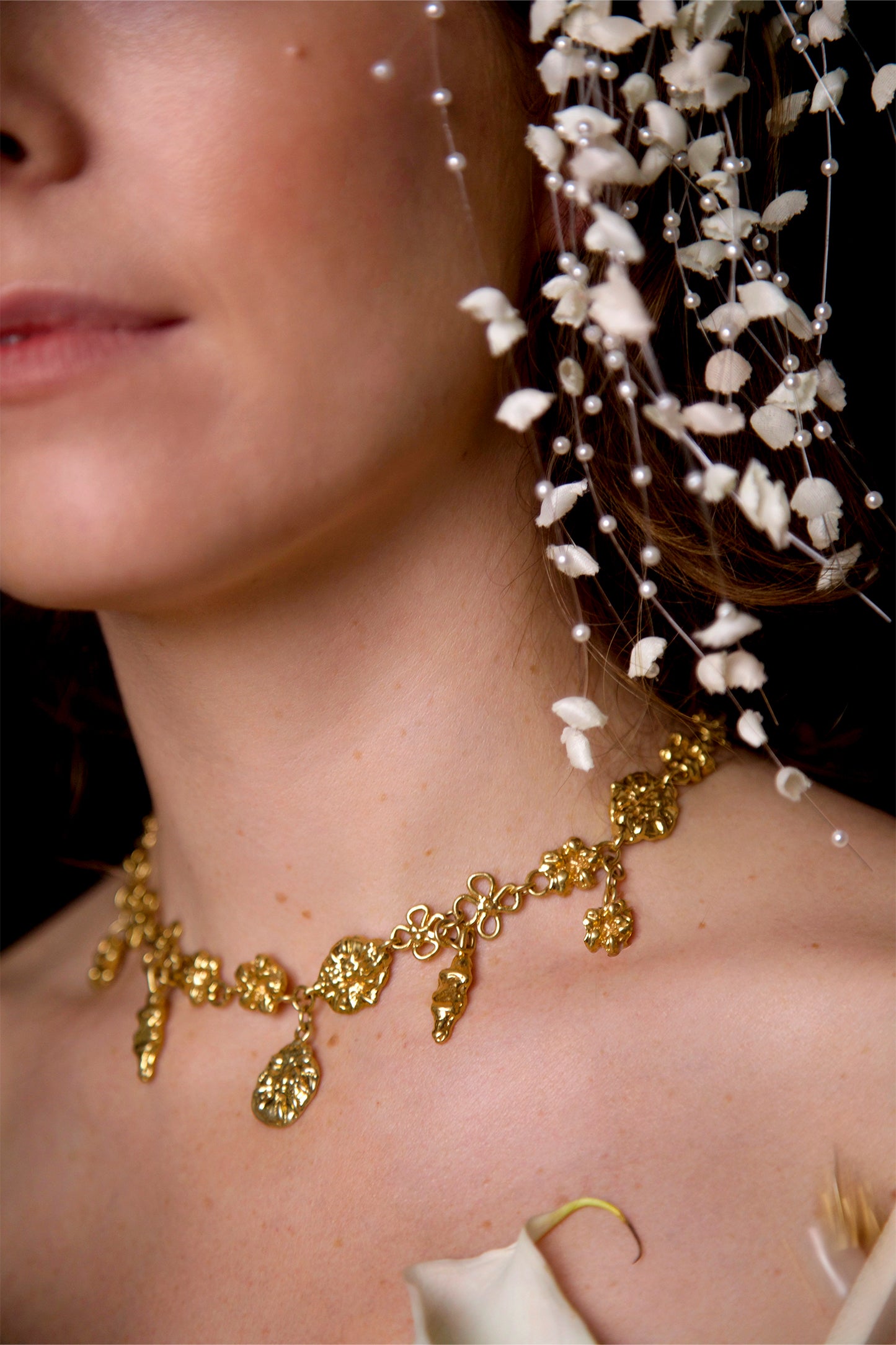 Perfect for a wedding! The intricate sculptural hand crafted necklace is personal and romantic! Paired with another CLARK piece, these unique adornments make a beautiful coordinated set.