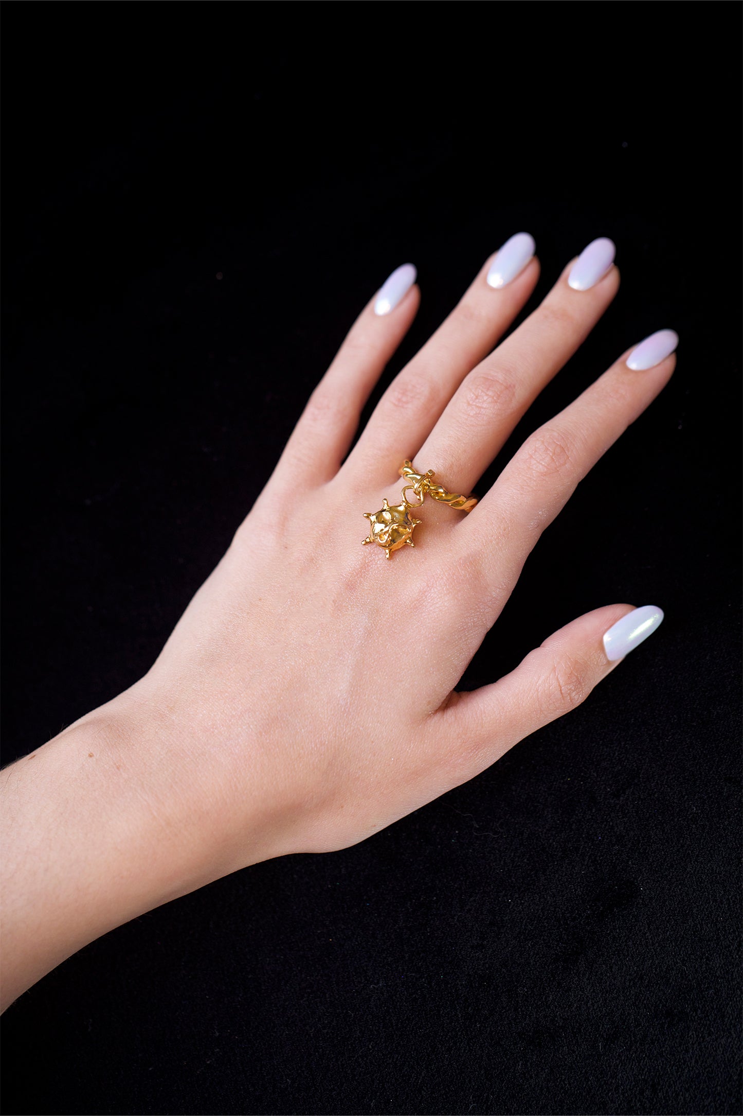 This is a one-of-a-kind, hand-made ring, featuring a sun talisman charm. A romantic gift!