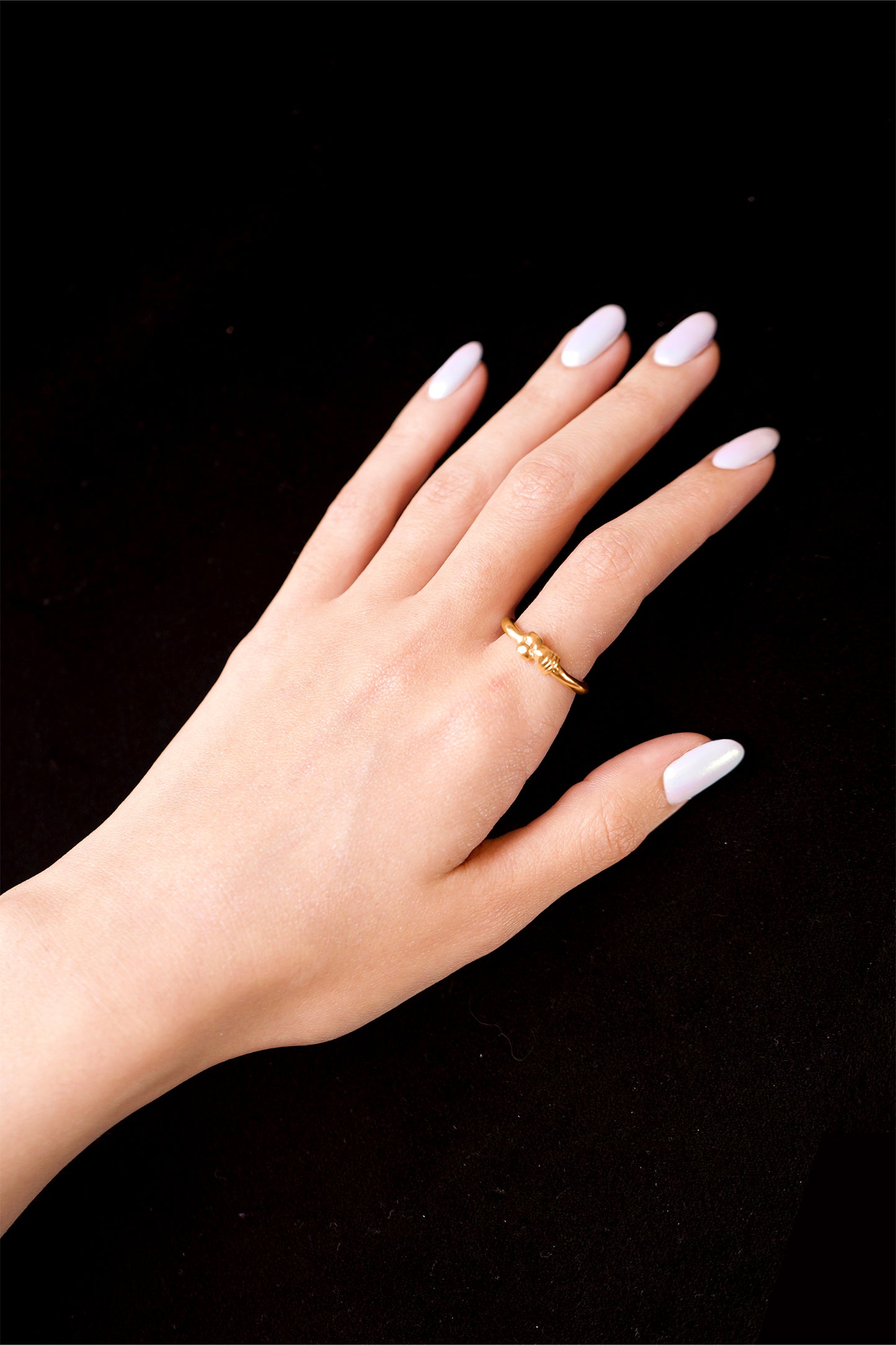 18K Gold Vermeil Eros Ring by CLARK. This high quality artisanal ring is bathed in a warm light and shows off this luxurious gold ring - a statement gift for any occasion. 