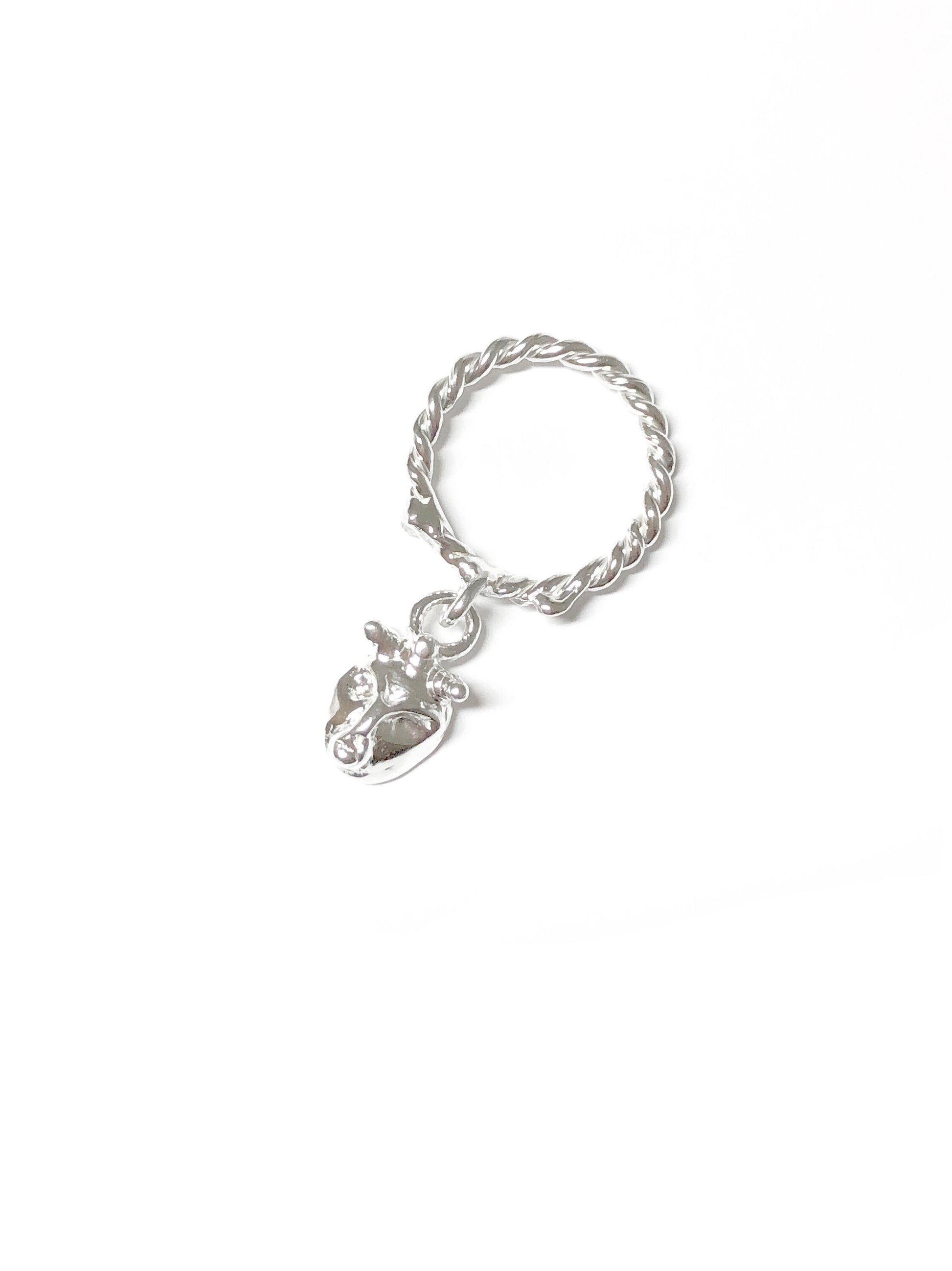  Product photo of Lilith Charm Ring by CLARK. Shoot against white, this unique statement gift is handcraft using the lost wax casting technique in Sterling Silver. 