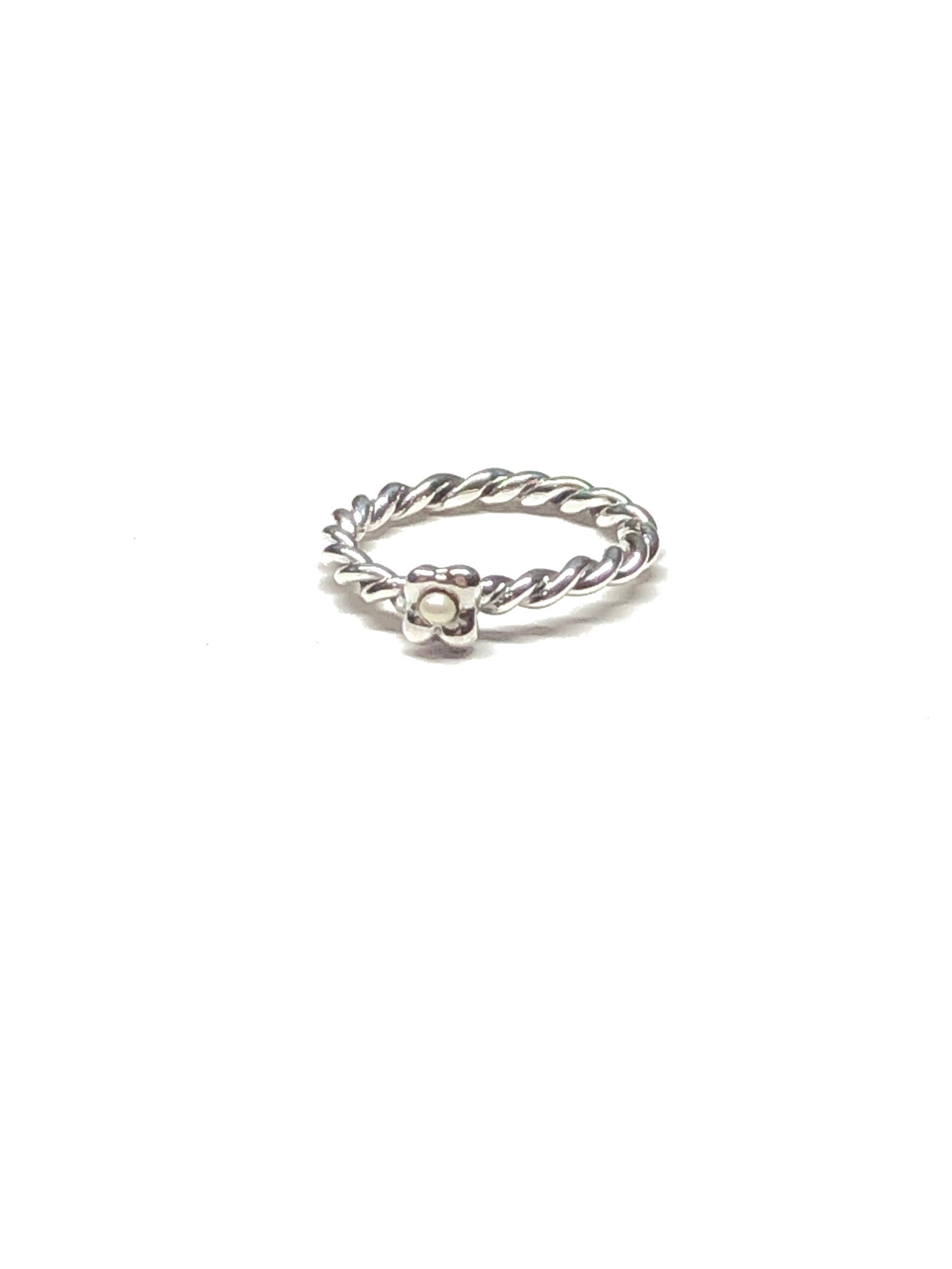 Product photo of Mini Mermaid Ring in Sterling Silver. This is a high quality one-of-a-kind ring featuring a tiny freshwater pearl, finished in a high-polish. 